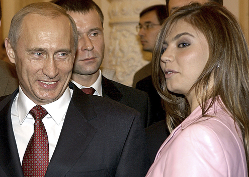 IMA NEKA TAJNA VEZA: Vladimir Putin i Alina Kabajeva / fotografije: reuters